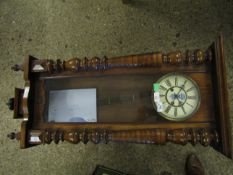 EARLY 20TH CENTURY WALNUT CASED VIENNA TYPE WALL CLOCK WITH OVERHANGING CORNICE AND BALUSTER