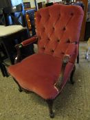 GOOD QUALITY FRENCH WALNUT CARVED ARMCHAIR WITH RED DRAYLON UPHOLSTERED SEAT AND BUTTON BACK