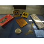 TWO 70S AA BADGES, BOXED PEN SET, BASE METAL STAMP CASE AND A NICKEL COMPASS