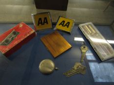 TWO 70S AA BADGES, BOXED PEN SET, BASE METAL STAMP CASE AND A NICKEL COMPASS