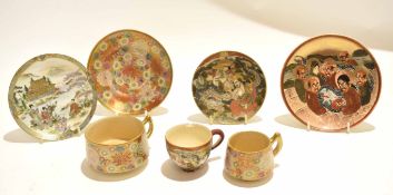 Group of three Satsuma earthenware cups and saucers together with a further Satsuma saucer, (7)
