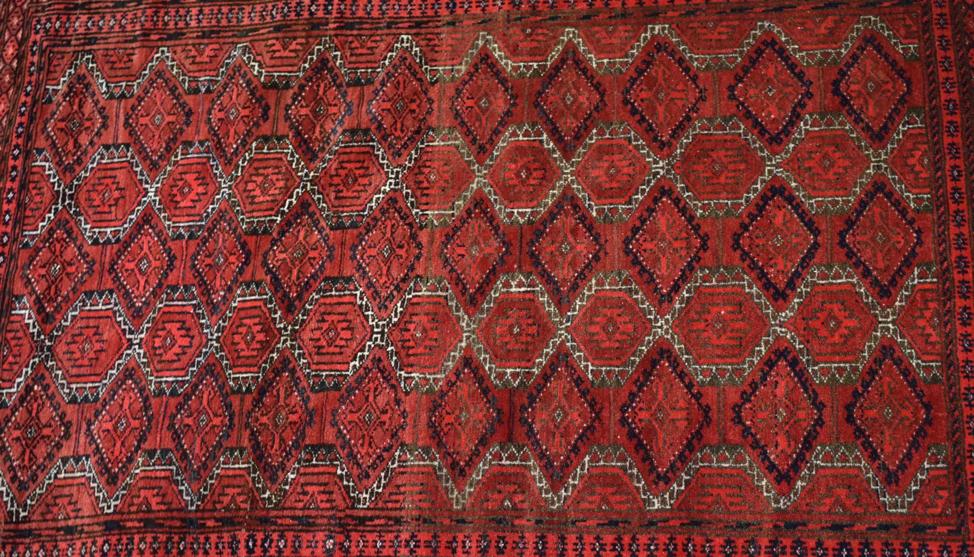 Good quality small Bokhara type carpet with a red field, with diamond repeating lozenge on a multi- - Image 3 of 3