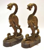 Pair of bronze griffon formed fender ends on heavy cast bases, each 33cm tall