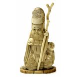 Early 20th century ivory model of an immortal, probably Shou Lao, 10cm high