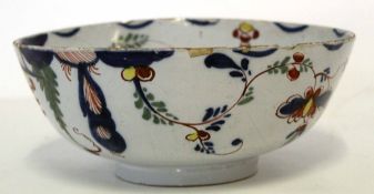 Mid-18th century English Delft bowl with floral design in polychrome, 27cm diam