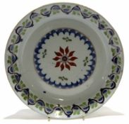 Mid-18th century Delft plate with polychrome design, 23cm diam