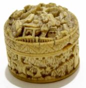 Early 20th century ivory circular Chinese box and cover, the cover carved with Chinese figures,