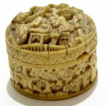 Early 20th century ivory circular Chinese box and cover, the cover carved with Chinese figures,