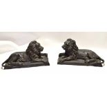 Pair of 20th century cast hollow bronze models of recumbent lions, 53cm long (max) x 21cm deep x