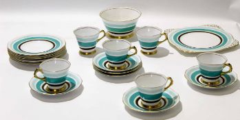 Art Deco part tea set made by Tuscan China, retailed by Lawleys, Regent St, the cups of lobed form