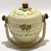 1930s biscuit barrel made by Wilkinson in the style of Clarice Cliff, the biscuit barrel with wicker