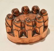 Victorian oval copper 8-point jelly or blancmange mould, stamped 20 beneath an orb and cross, 12cm x