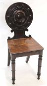 Early Victorian mahogany hall chair with hard seat, ring turned legs, the circular back with