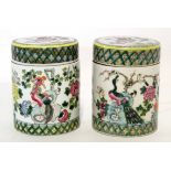 Pair of Chinese porcelain famille rose/vert jars and covers decorated in typical fashion, 16cm high