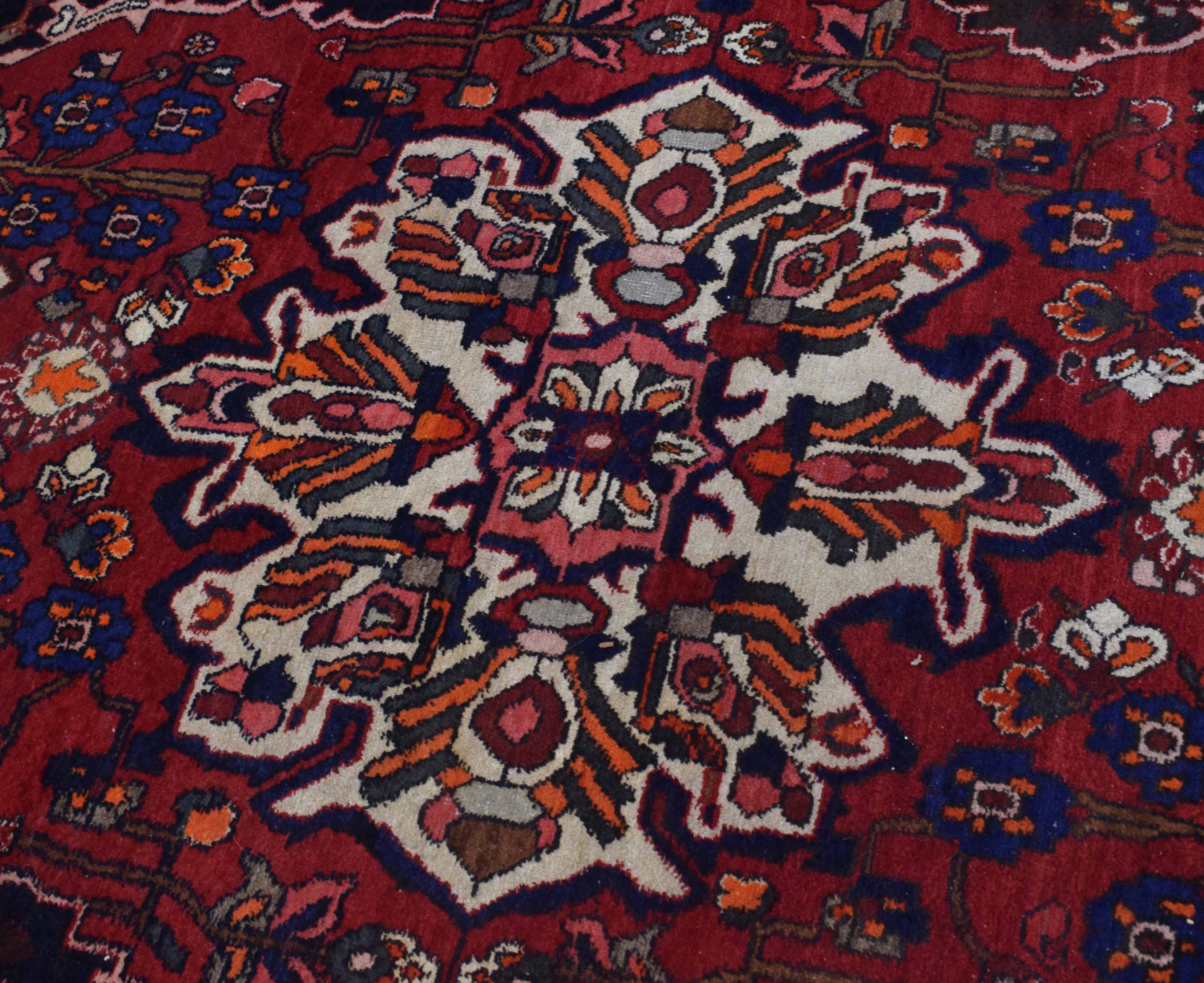 Good quality modern carpet with multi-coloured decoration among red field with a floral design and - Image 3 of 4
