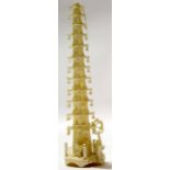 Early 20th century ivory model of a temple with each branch containing small bells with ivory