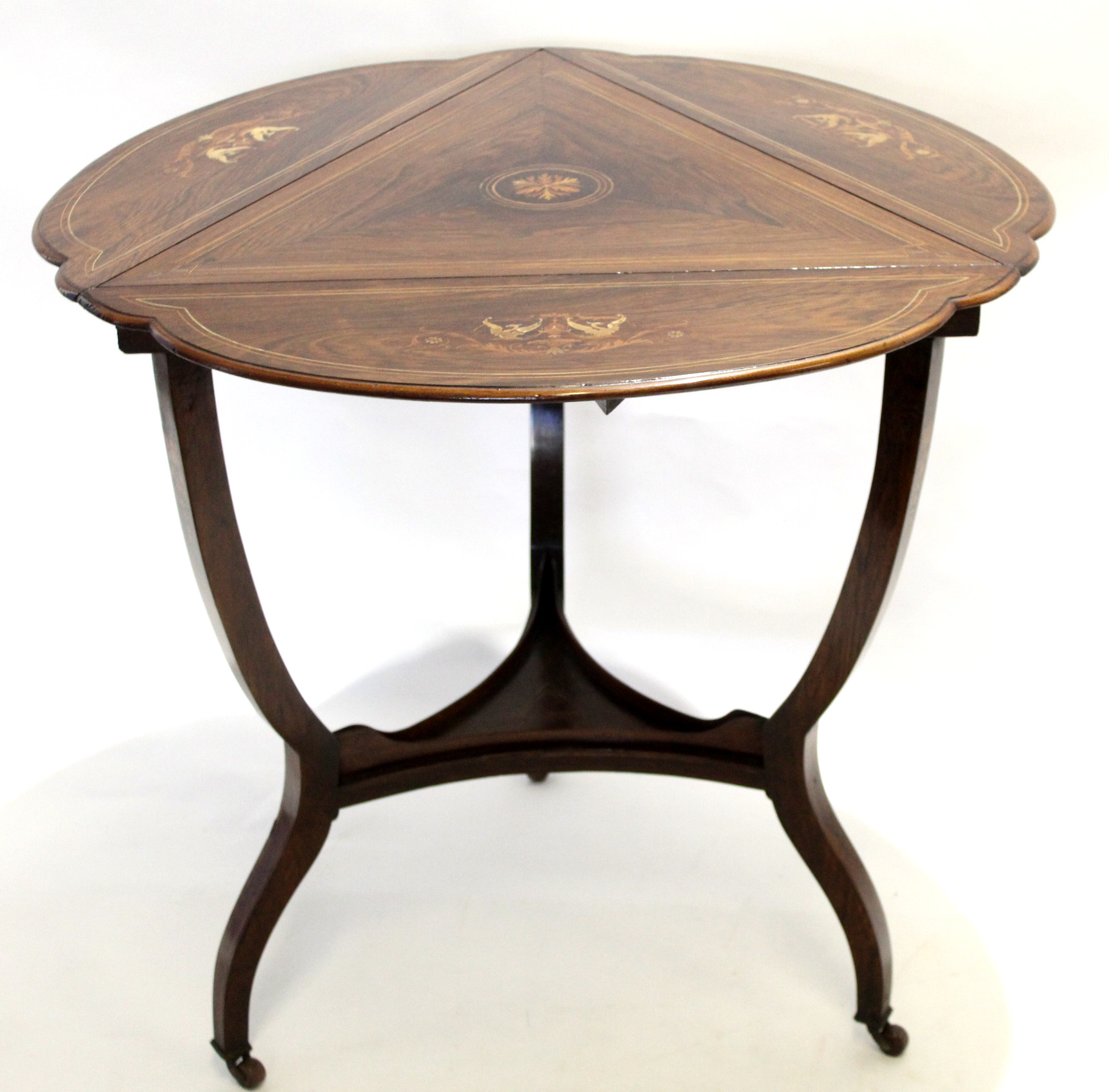 19th century rosewood and inlaid triangular occasional table with three drop flaps with open shelves