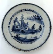 Large mid-18th century Delft dish with chinoiserie type design, 34cm diam