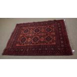 Good quality modern Khal carpet decorated with rust ground and floral and geometric design to