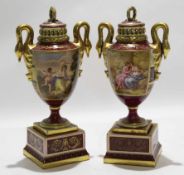 Two Vienna style vases and covers, the vases decorated with classical scenes, one signed P T