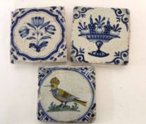 Collection of three 18th century Delft tiles, two with floral and fruit decoration and a further