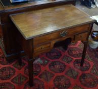 19th century mahogany side table of rectangular form, a long drawer and two short drawers to the