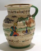 Crown Ducal jug with tube lined Middle Eastern design by Charlotte Rhead, with a verse above and