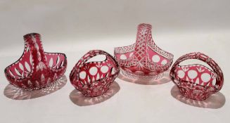 Group of four cut glass baskets all decorated in Bohemian style with two larger and two smaller