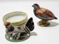 Pottery model of a bird on oval base, together with a Staffordshire hen tureen, the cover modelled