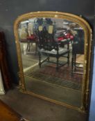 19th century gilt and gesso overmantel mirror, with an arched top and scroll to base, 127cm wide x