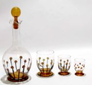 French globe and shaft decanter with enamelled naive type flowers in black and brown, together