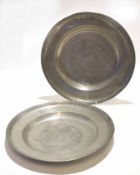 Pair of 19th century pewter plates with engraved armorial centre, with rose mark stamp to reverse,