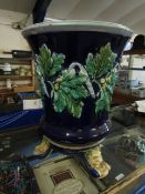 MAJOLICA BLUE AND GREEN GROUND JARDINIERE WITH RAISED DECORATION TOGETHER WITH STAND (2)