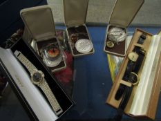 TWO CASES CONTAINING GENTS WRISTWATCHES, MEDALLIONS ETC