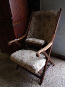 AMERICAN OAK FRAMED ARMCHAIR WITH X-FRAME STRETCHER TOGETHER WITH A FURTHER SQUAT STOOL