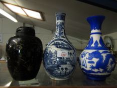 19TH CENTURY ORIENTAL BLUE AND WHITE PRINTED VASE, A BLACK AND GILDED VASE WITH TREEN LID WITH SIX