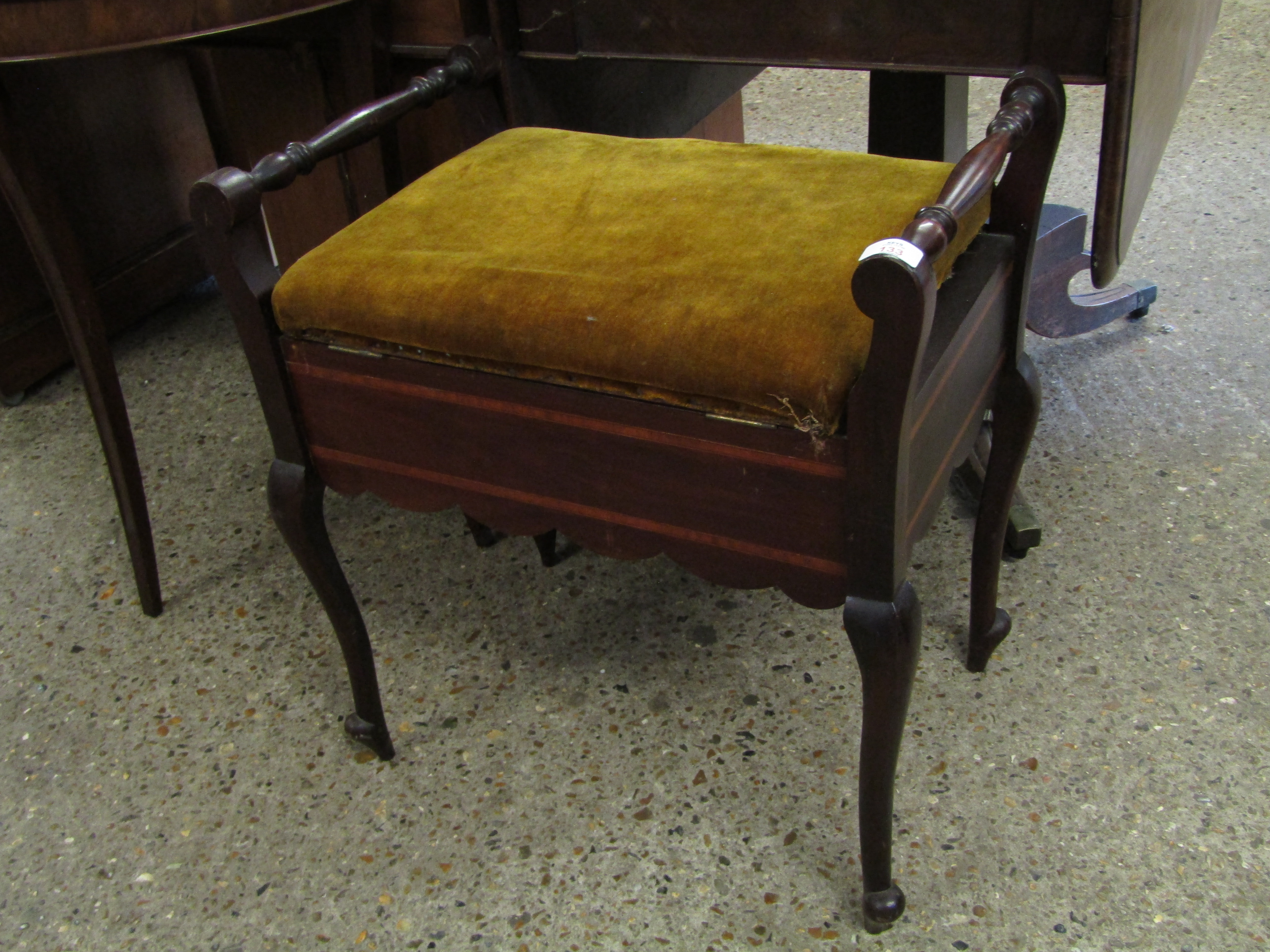 EDWARDIAN WALNUT RAIL SIDED PIANO STOOL WITH UPHOLSTERED LIFT UP LID