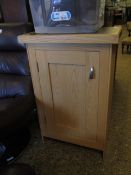 MODERN OAK SIDE OR KITCHEN CUPBOARD WITH SINGLE PANELLED DOOR