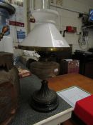 VICTORIAN OIL LAMP WITH CLEAR FONT AND BLACK SLAG BASE