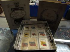 TIN CONTAINING MIXED BROOKE BOND TEA CARDS TOGETHER WITH FOLDER OF KING GEORGE VI AND QUEEN