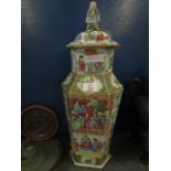 19TH CENTURY FAMILLE ROSE LIDDED VASE IN TYPICAL COLOURS WITH FIGURAL PAINTED SCENES WITH FIGURE