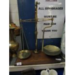 SET OF VICTORIAN BRASS BEAM SCALES ON A MAHOGANY PLINTH