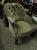 VICTORIAN MUSHROOM UPHOLSTERED BUTTON BACK ARMCHAIR WITH TURNED FRONT LEGS AND RAISED ON PORCELAIN