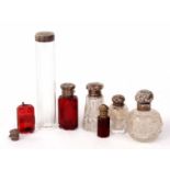 Mixed Lot: six various silver lidded toiletry bottles including two ruby glass scent bottles (both