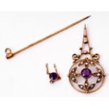 Edwardian amethyst and seed pearl open work pendant with central millegrain set amethyst with four