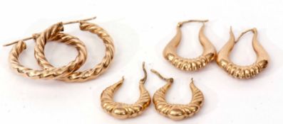 Large pair of 9Kt stamped rope twist earrings, together with two pairs of 9ct gold hoop earrings,