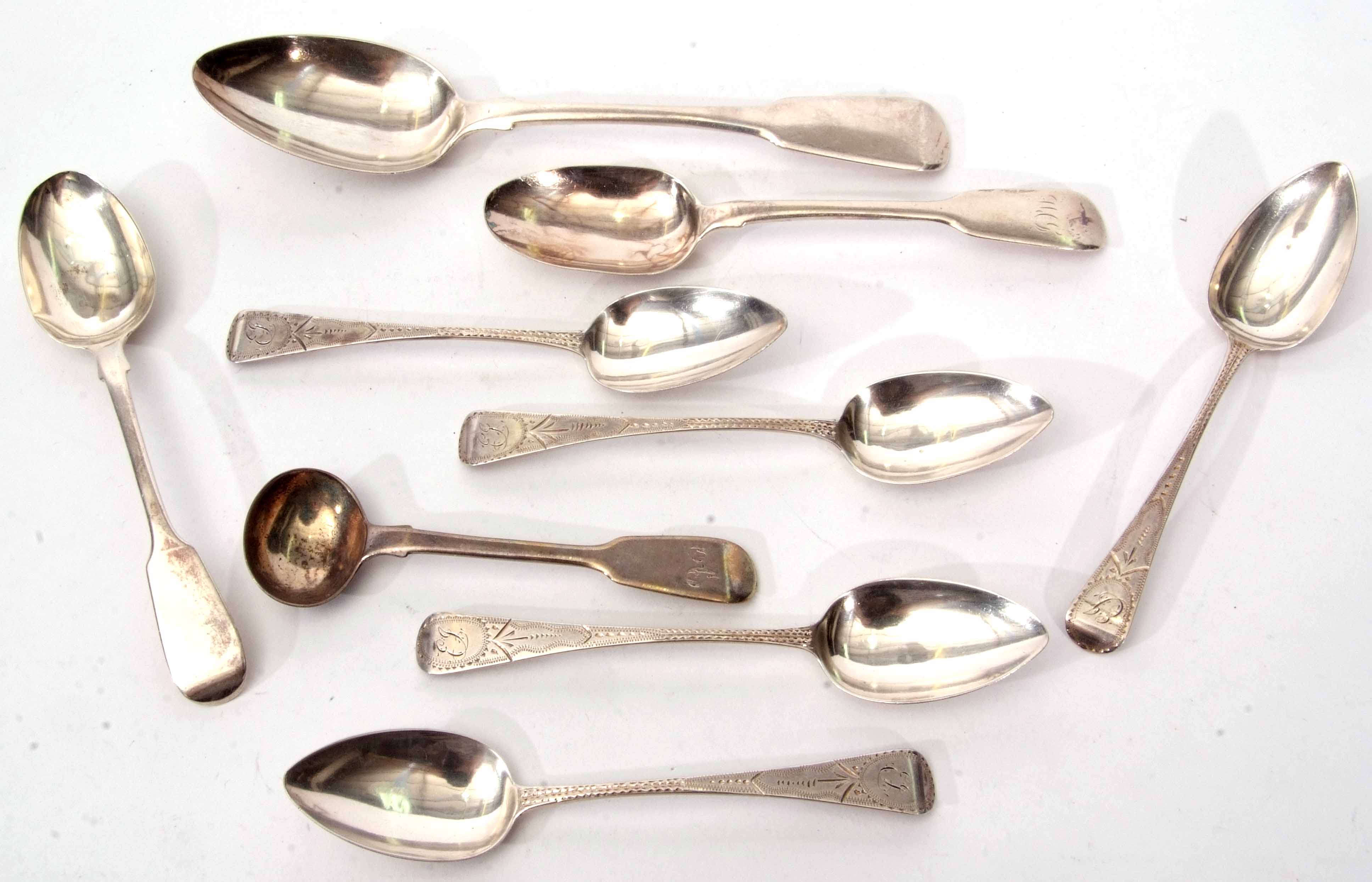 Mixed Lot: comprising five George III bright cut Old English pattern tea spoons, initialled,