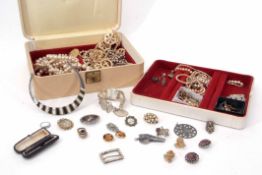 Cream jewel box and contents to include mainly costume jewellery plus a white metal Siamese