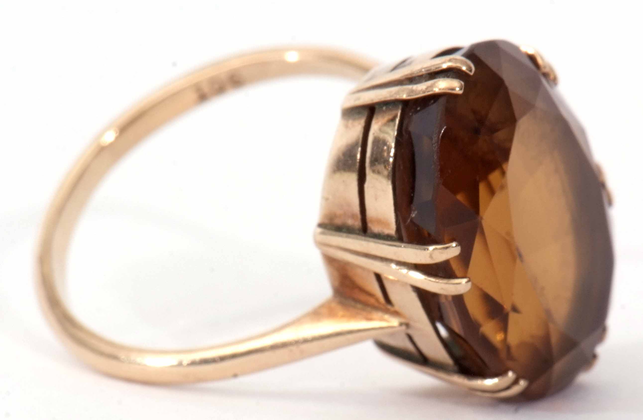 A 9ct stamped citrine dress ring, oval shaped (20 x 14mm), faceted design, claw set and raised in - Image 4 of 5