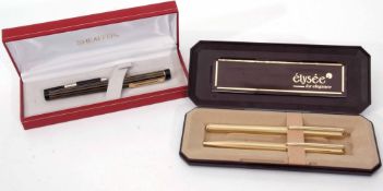 Mixed Lot: cased Sheaffer black and gilt highlighted fountain pen, nib marked 585, 14K in a red